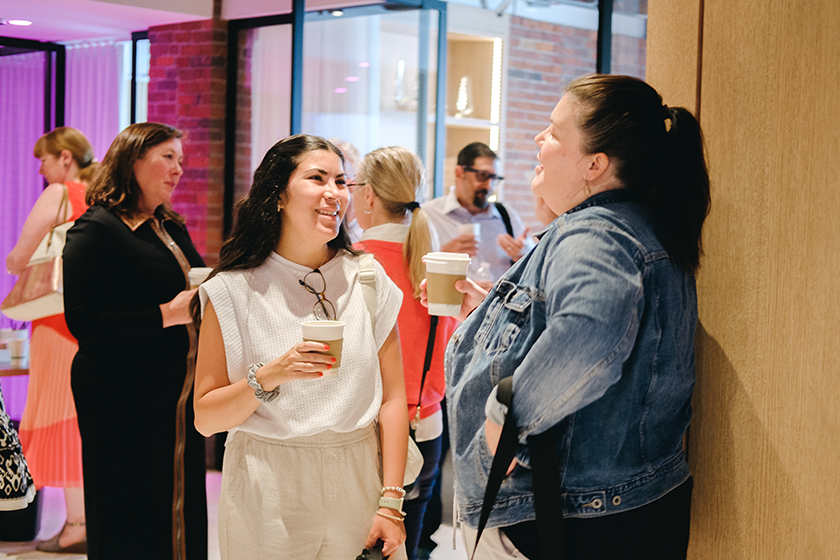 Guests mingling at the Luxury Report event